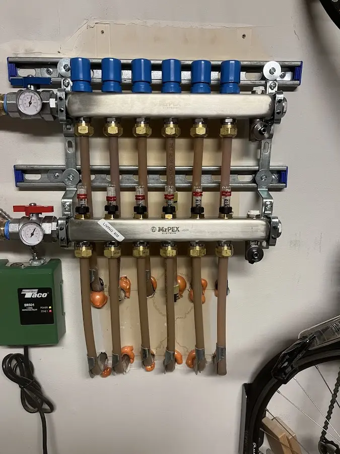 Plumber performing Gas Line Installation at a residential property in Forks